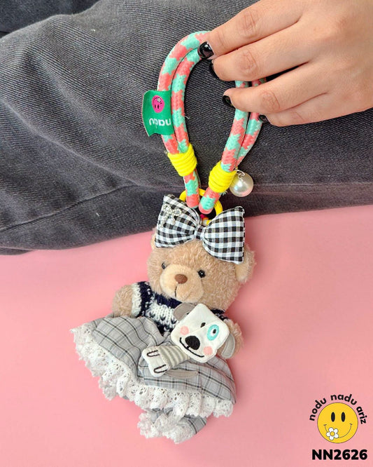 NN2626 Charms Osita grande con sueter, falda y moño