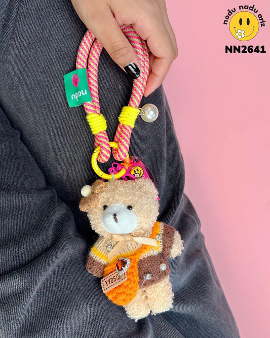 NN2641 Charms Osita con sueter cafe y bolsita naranja